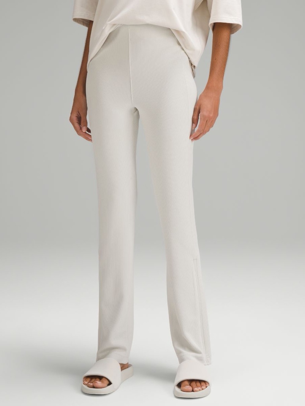 Lululemon Brushed Softstreme Ribbed Zip
Flared Pant  
Color - Bone
Size 6